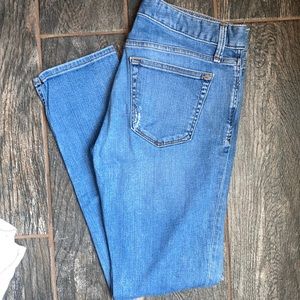 Light wash distress denim jeans